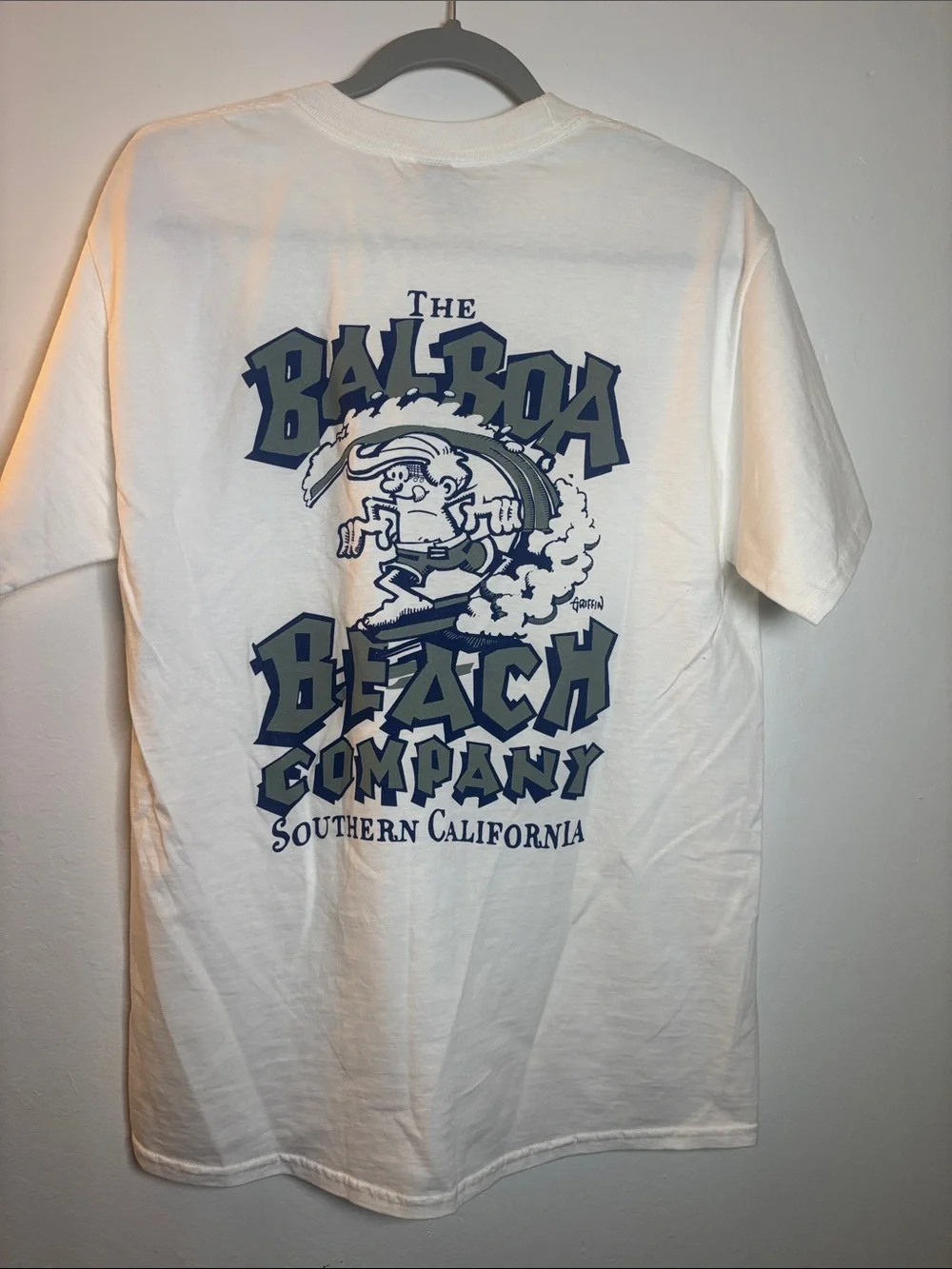 short-sleeve t-shirt with a reading logo 